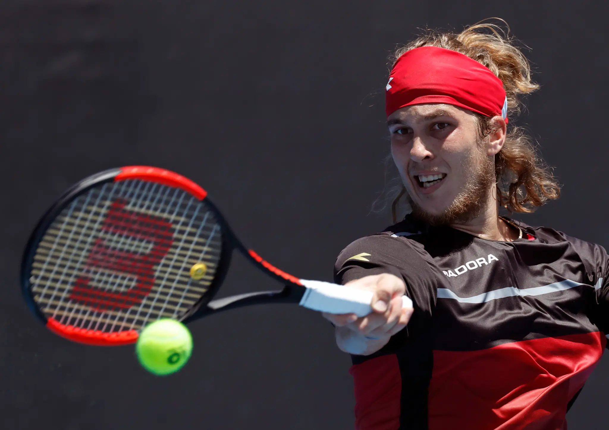 Slovenský tenista Lukáš Lacko v dueli 2. kola Australian Open proti Dudovi Selovi.