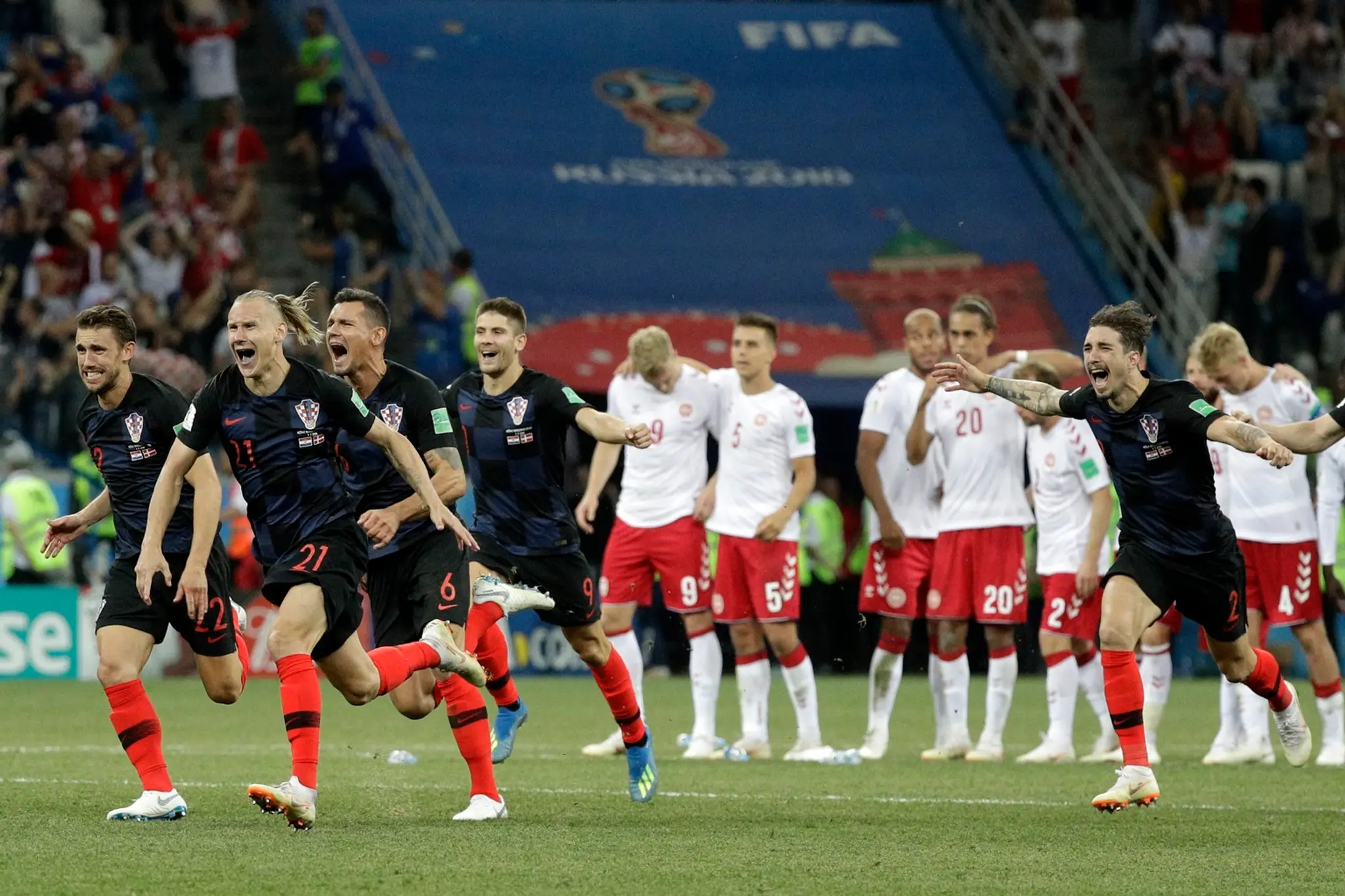 Radosť Chorvátov a smútok Dánov po poslednej penalte