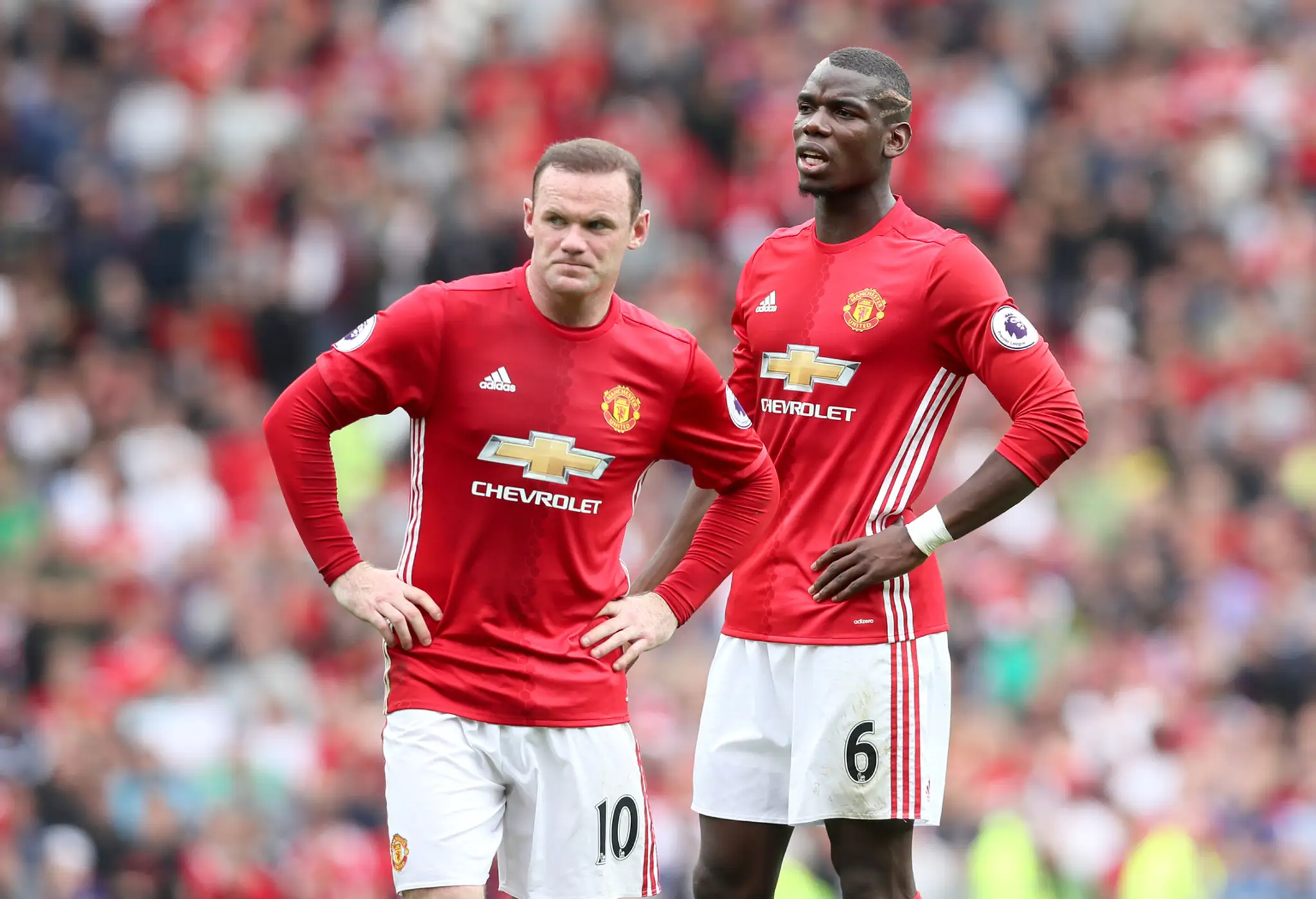 Rooney a Pogba.