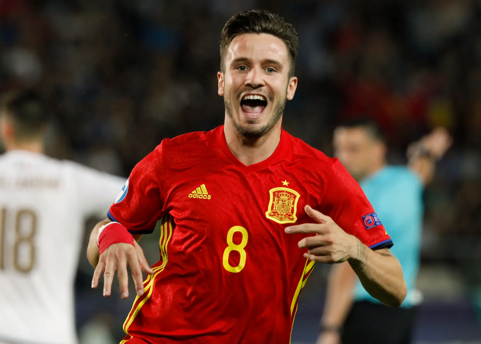Saúl Níguez zo Španielska jasá po svojom góle v semifinále ME 21 proti Taliansku.