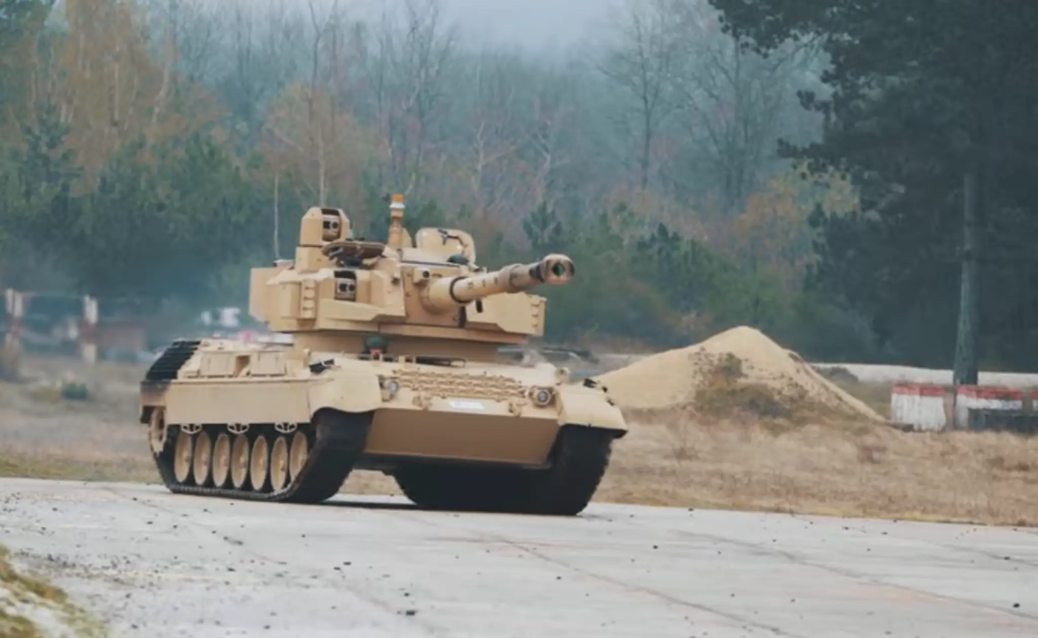 Leopard 1A5 s vežou Cockerill 