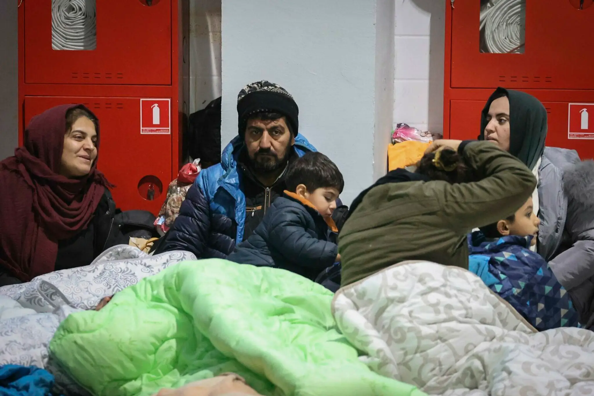 Migranti v Bielorusku v provizórnom útočisku