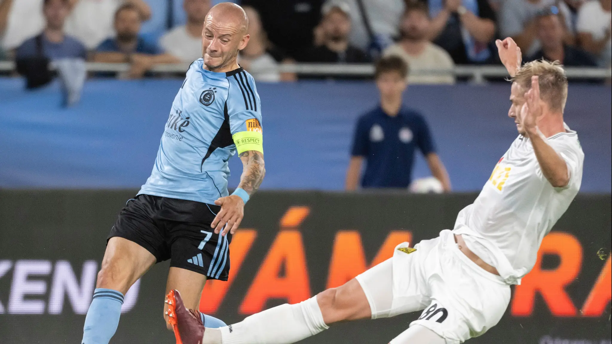 Na snímke zľava kapitán Vladimír Weiss ml. (Slovan) a Egor Sorokin (Almaty). (cropped)