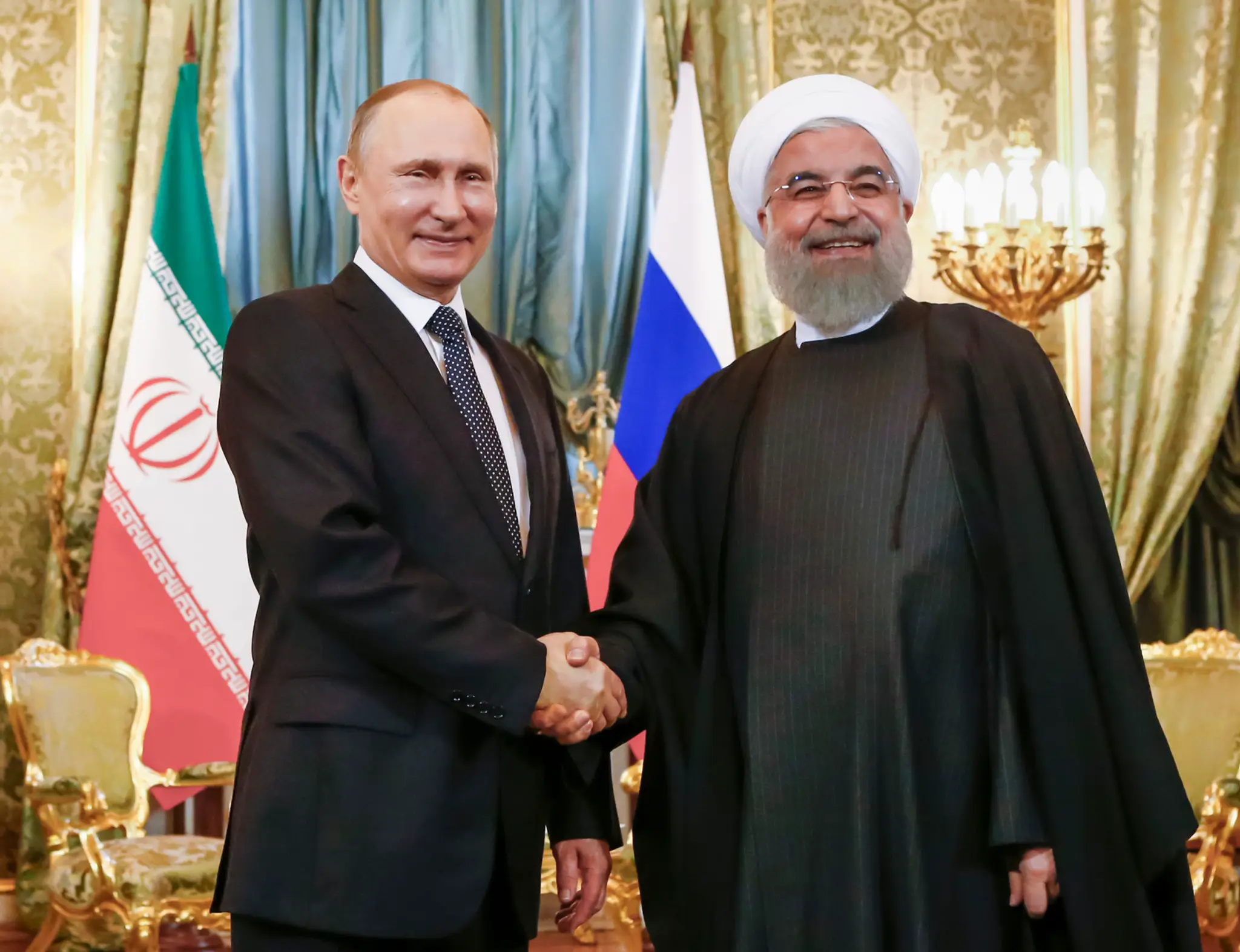 Vladimiír Putin a iránsky prezident Hassan Rouhani.