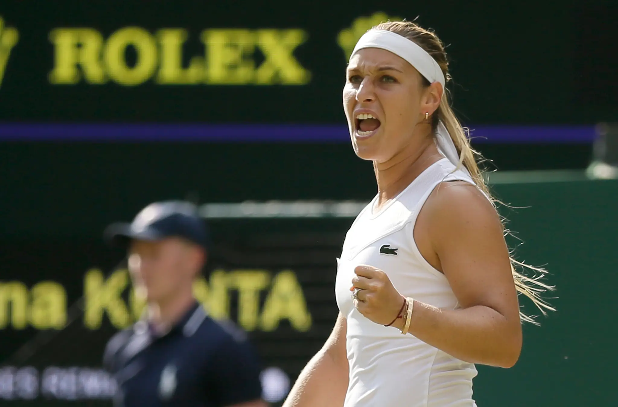 Slovenská tenistka Dominika Cibulková sa teší v 2. kole vo Wimbledone.