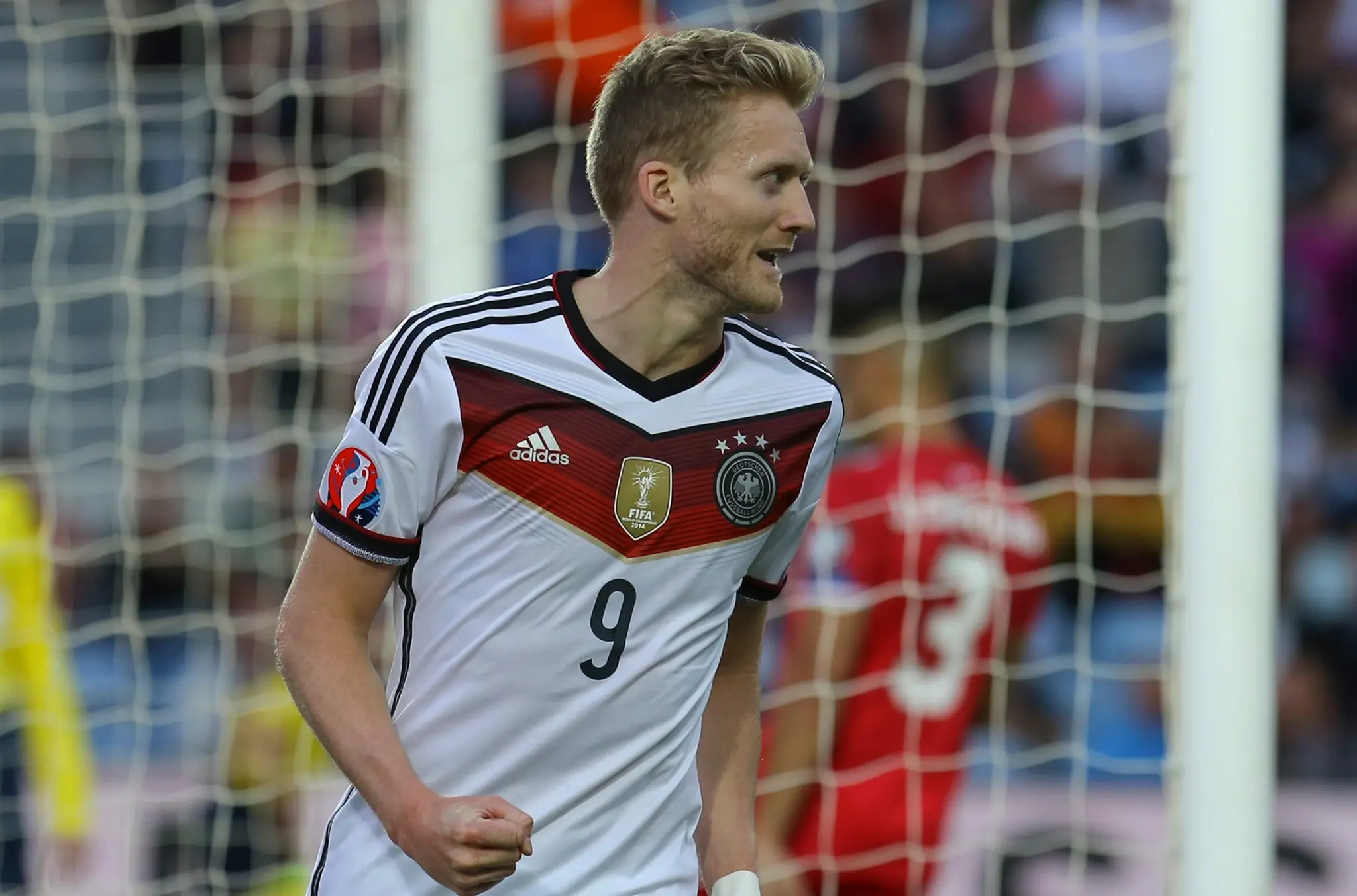 Nemecký futbalista André Schürrle sa raduje z gólu