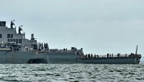 Potápači našli telá všetkých námorníkov nezvestných po havárii torpédoborca USA