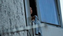 Snímka zúfalého muža, ktorý volal o pomoc, obletela svet. Z horiaceho pekla ho vyslobodili