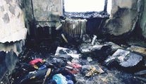 Požiar bytu v Detve spôsobila manipulácia so zapaľovačom. Deti aj ich stará mama sú v nemocnici