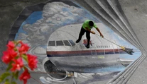 Stratený malajzijský boeing v poslednej fáze letu zrejme nikto nepilotoval