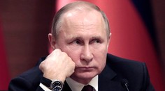 Putin požiadal Merkelovú, aby dohovorila Ukrajine