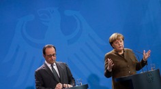 Merkelová a Hollande trvajú na plnení minských dohôd, hrozia predĺžením sankcií