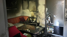 Ranný požiar v Petržalke. Ženu z bytu odviezli záchranári