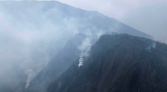 Fatálny lesný požiar v Číne spôsobil blesk. Zahynuli pri ňom tri desiatky hasičov