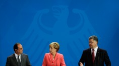 O situácii na Ukrajine rokovali dnes v Berlíne Merkelová, Hollande a Porošenko