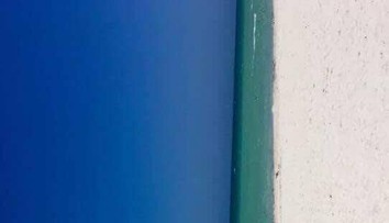 Táto fotka vám zamotá hlavu: Vidíte na obrázku dvere alebo pláž?