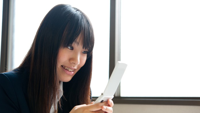 Japonka s mobilom - Ilustračná snímka