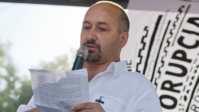 Bývalý zástupca riaditeľa Národnej jednotky finančnej polície NAKA Jozef Lutter na druhom proteste proti korupcii v Bratislave.