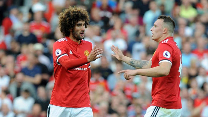 Marouane Fellaini a Phil Jones.