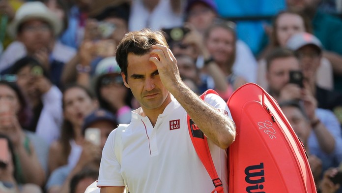 Roger Federer po prehre vo štvťfinále Wimbledonu s Kevinom Andersonom.