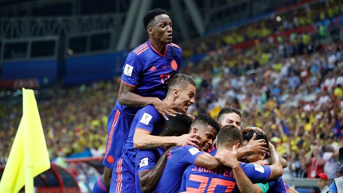 Hráči Kolumbie sa radujú po góle do siete Poľska.