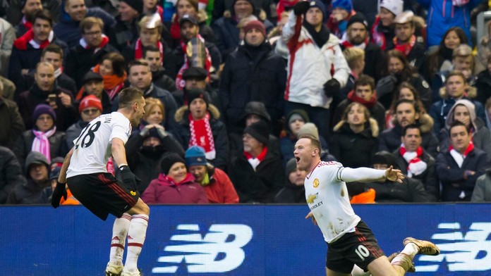 Wayne Rooney a jeho radosť z gólu.