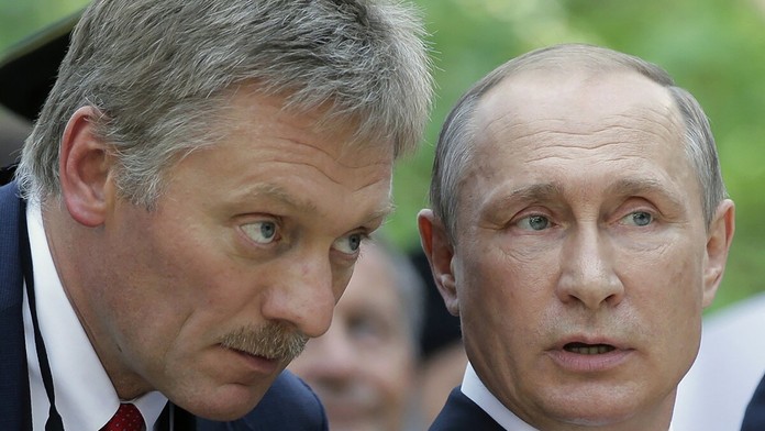 Dmitrij Peskov a Vladimir Putin