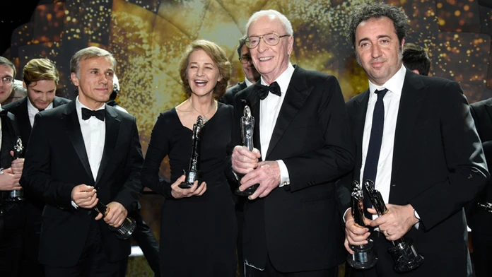 Christoph Waltz, Charlotte Ramplingová, Michael Caine a režisér Paolo Sorrentino.