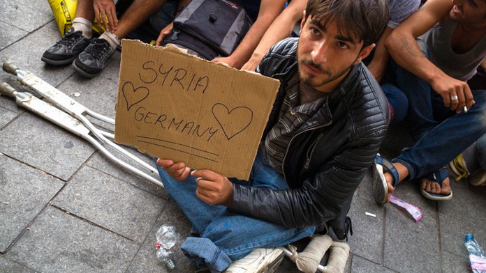 Migranti na stanici v Budapešti.