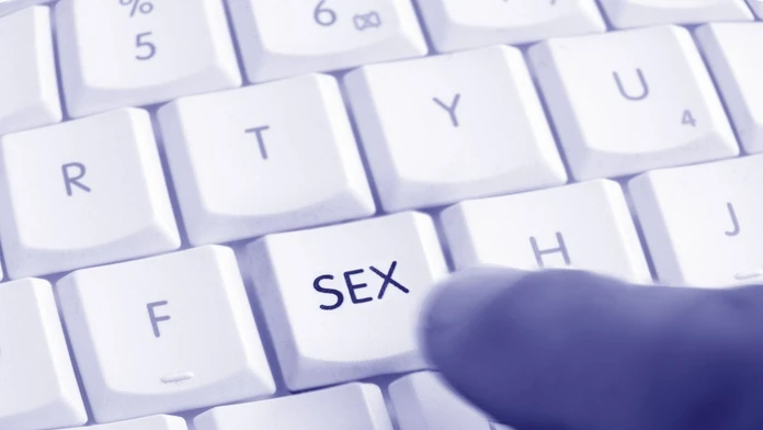 Klávesnica počítača, na ktorej je znázornené slovo sex.