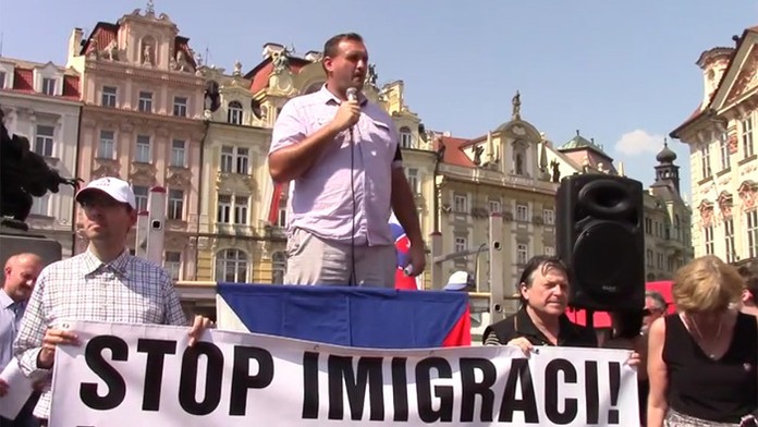 Marián Magát na proteste v Prahe, kde ho zadržali.