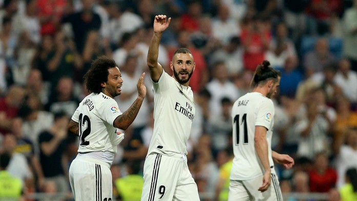 Benzema oslavuje svoj druhý gól proti Leganes.