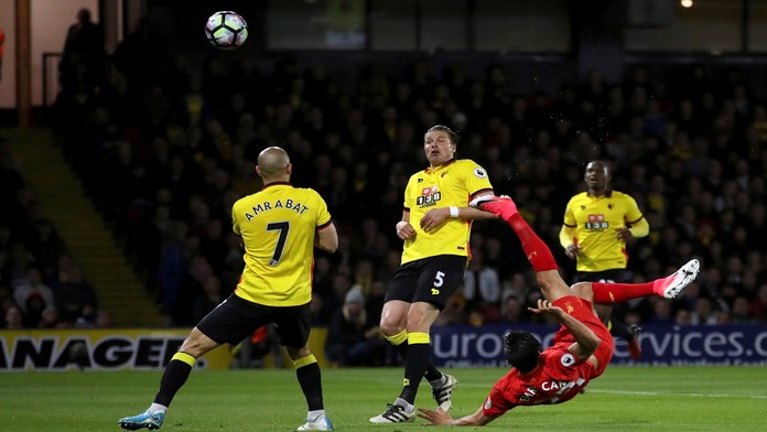 Na snímke hráč Liverpoolu Emre Can strieľa gól v zápase 35. kola anglickej Premiere League FC Watford - FC Liverpool.