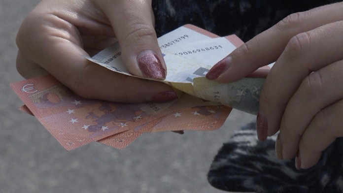 Poškodená bankovka.