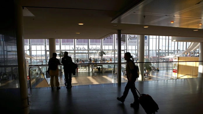Cestujúci na letisku Štokholm-Arlanda.