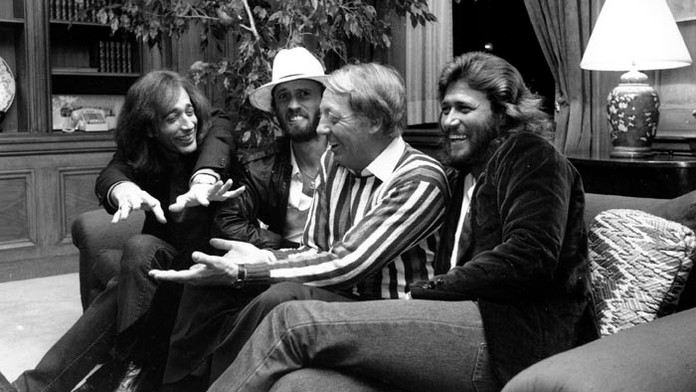 Robert Stigwood (druhý sprava)