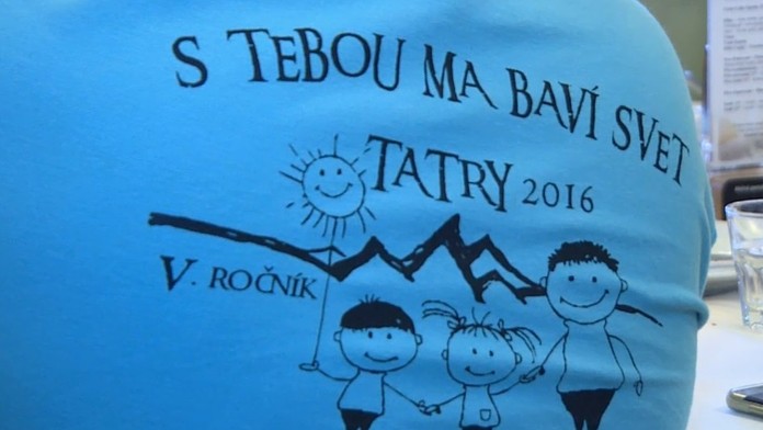 Otcovia a deti vo Vysokých Tatrách.