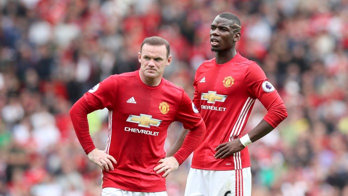 Rooney a Pogba.