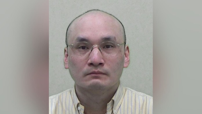 Thomas Kwan na policajnej snímke.