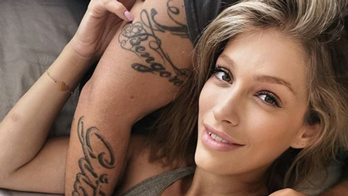 Tenista John Isner v 1. kole Wimbledonu.