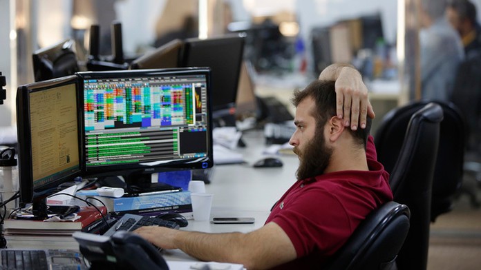 Maklér na burze po hlasovaní o brexite.