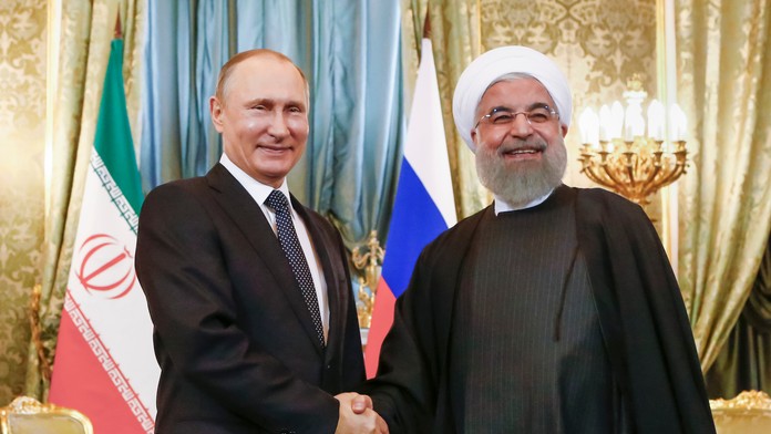 Vladimiír Putin a iránsky prezident Hassan Rouhani.