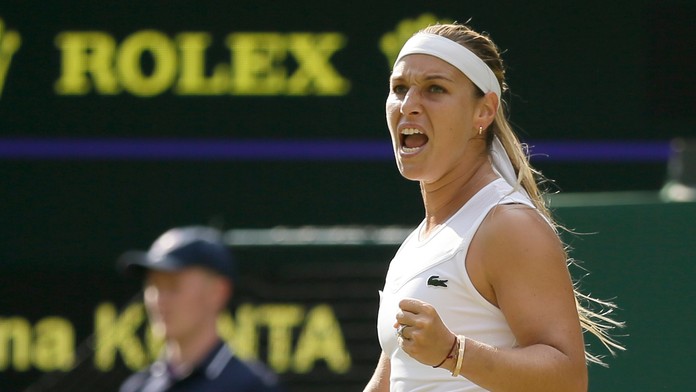 Slovenská tenistka Dominika Cibulková sa teší v 2. kole vo Wimbledone.