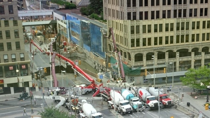 concrete-trucks-fill-in-rideau-street-sinkhole.jpg