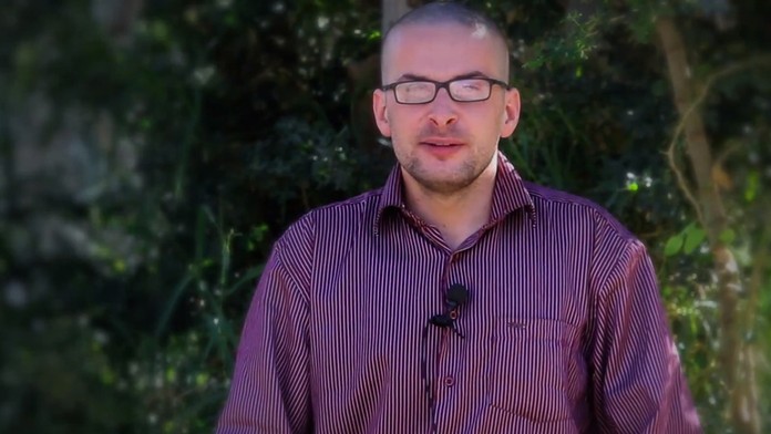 Americký fotoreportér Luke Sommers.