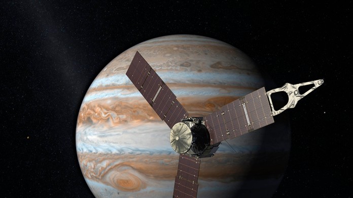 Na umeleckej snímke americká družica Juno nad planétou Jupiter.