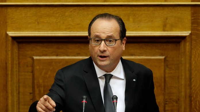 Na snímke uprostred francúzsky prezident Francois Hollande