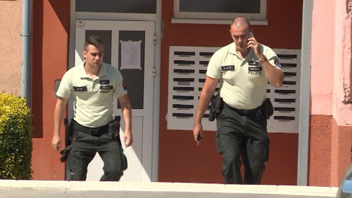 Policajti na mieste tragédie.