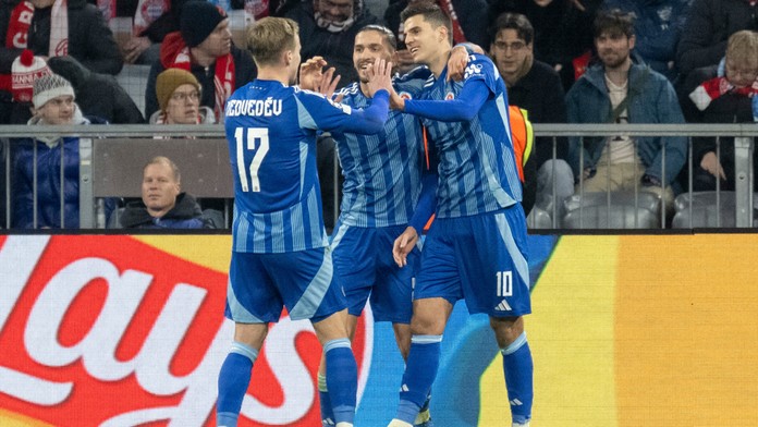 Oslavujúci hráči Slovanu