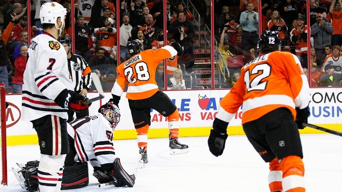 Michael Raffl s číslom 12.